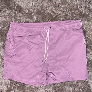 Purple shorts with stripes